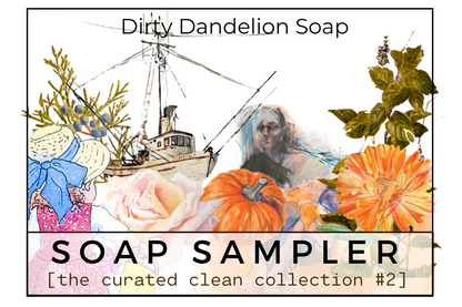 Rectangular label graphic with layered watercolor artwork including flowers, a pumpkin, a boat, and a human figure, with text reading Dirty Dandelion Soap and Soap Sampler the curated clean collection #2.